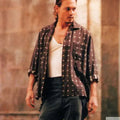The Red­dish Shirt With White De­signs Worn by Roux (John­ny Depp) in Choco­lat